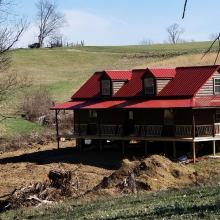 Cabin in field